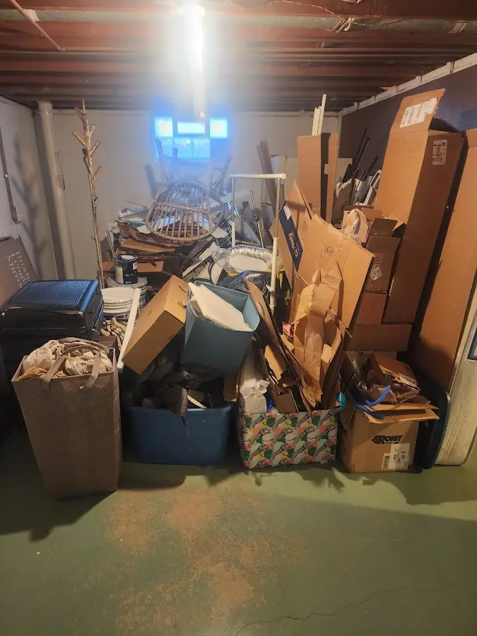 Roll-off dumpster container at job site for 4 Yard Dumpster Rental in Portage Lakes